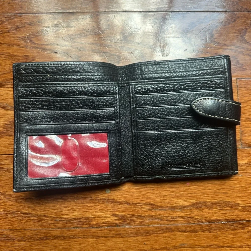 Dooney & Bourke pebble grain flap wallet a metal logo plate & contrast stitching
